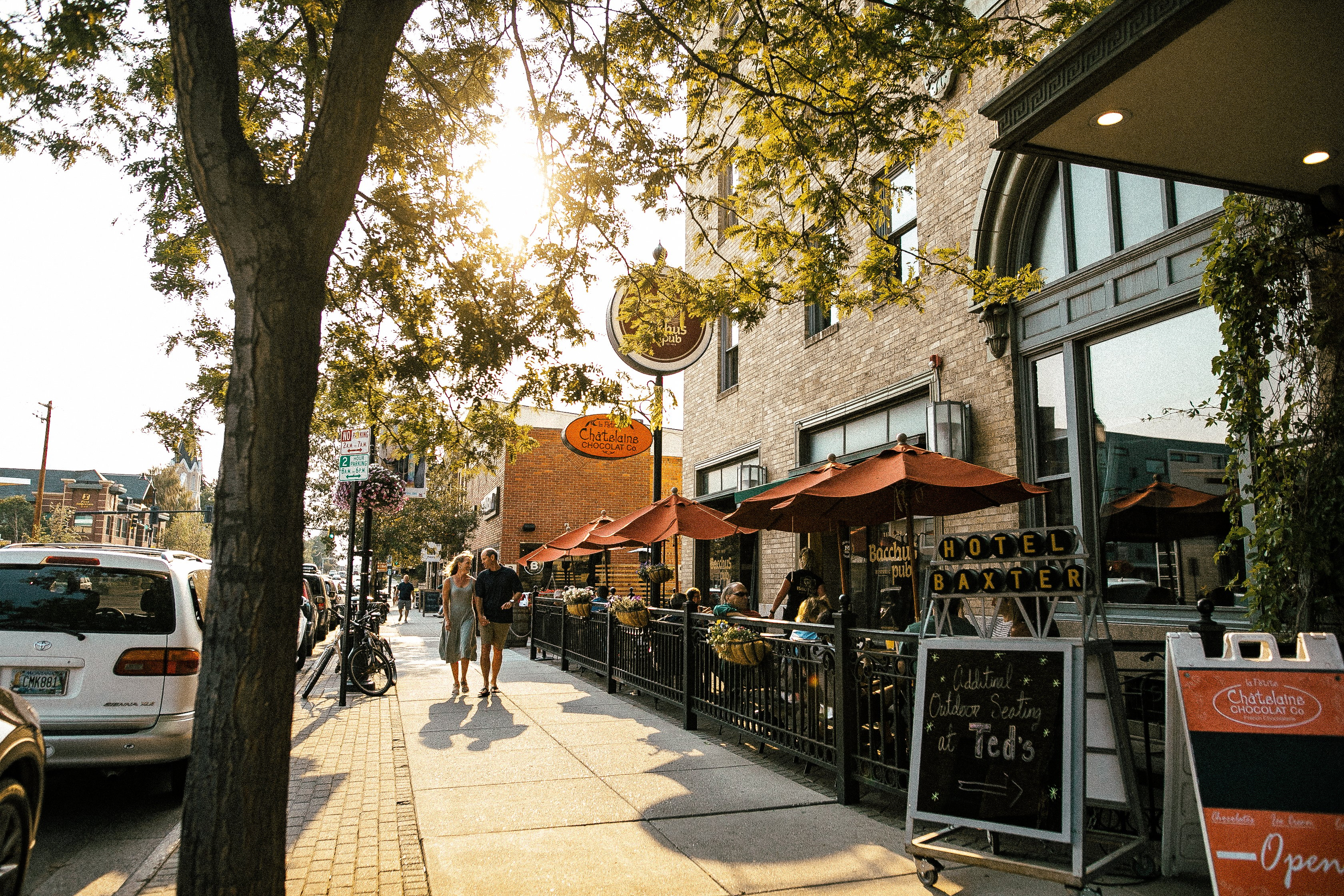 a couple strolling down Main Street in Bozeman