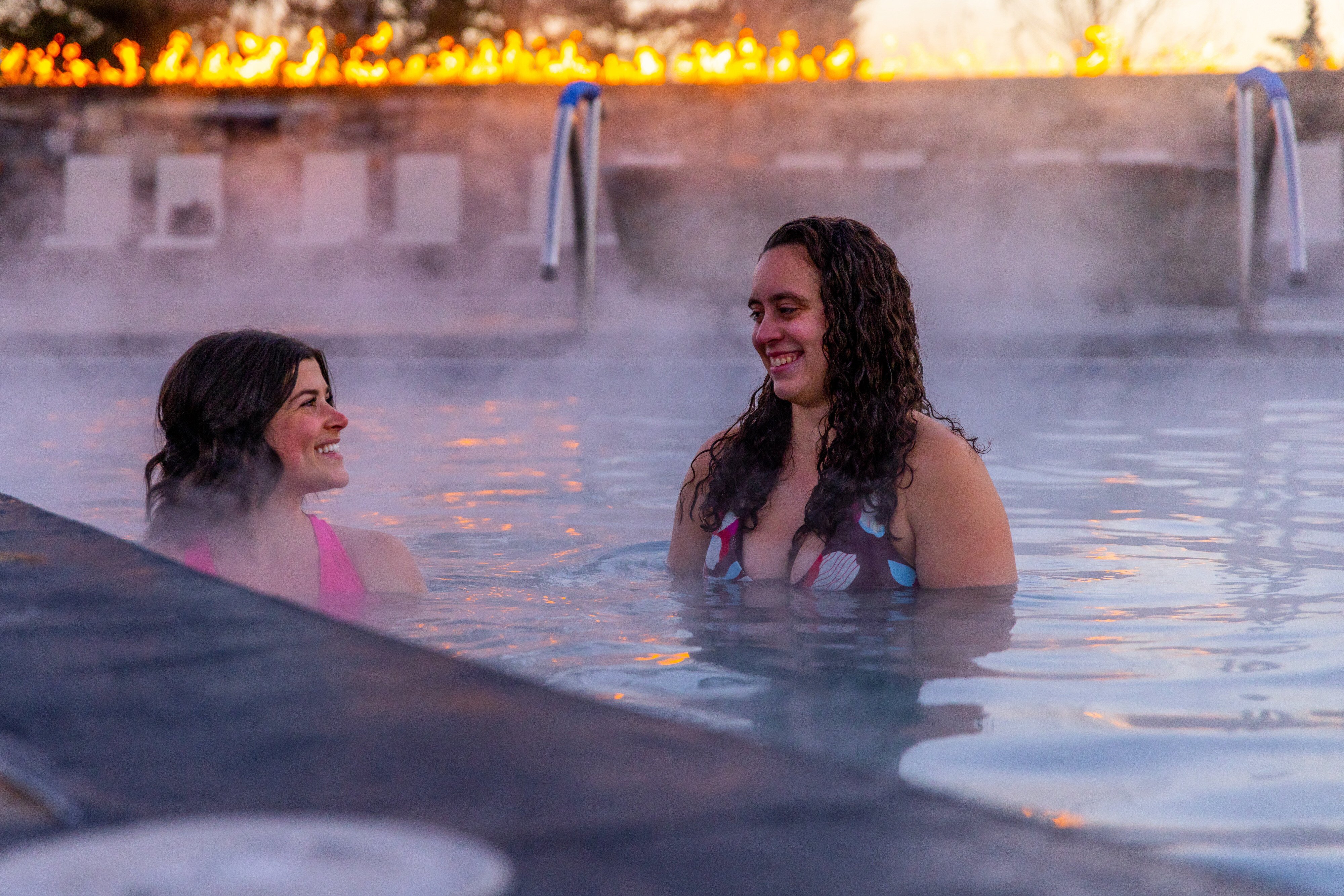 A couple soaking in Bozeman Hot Springs