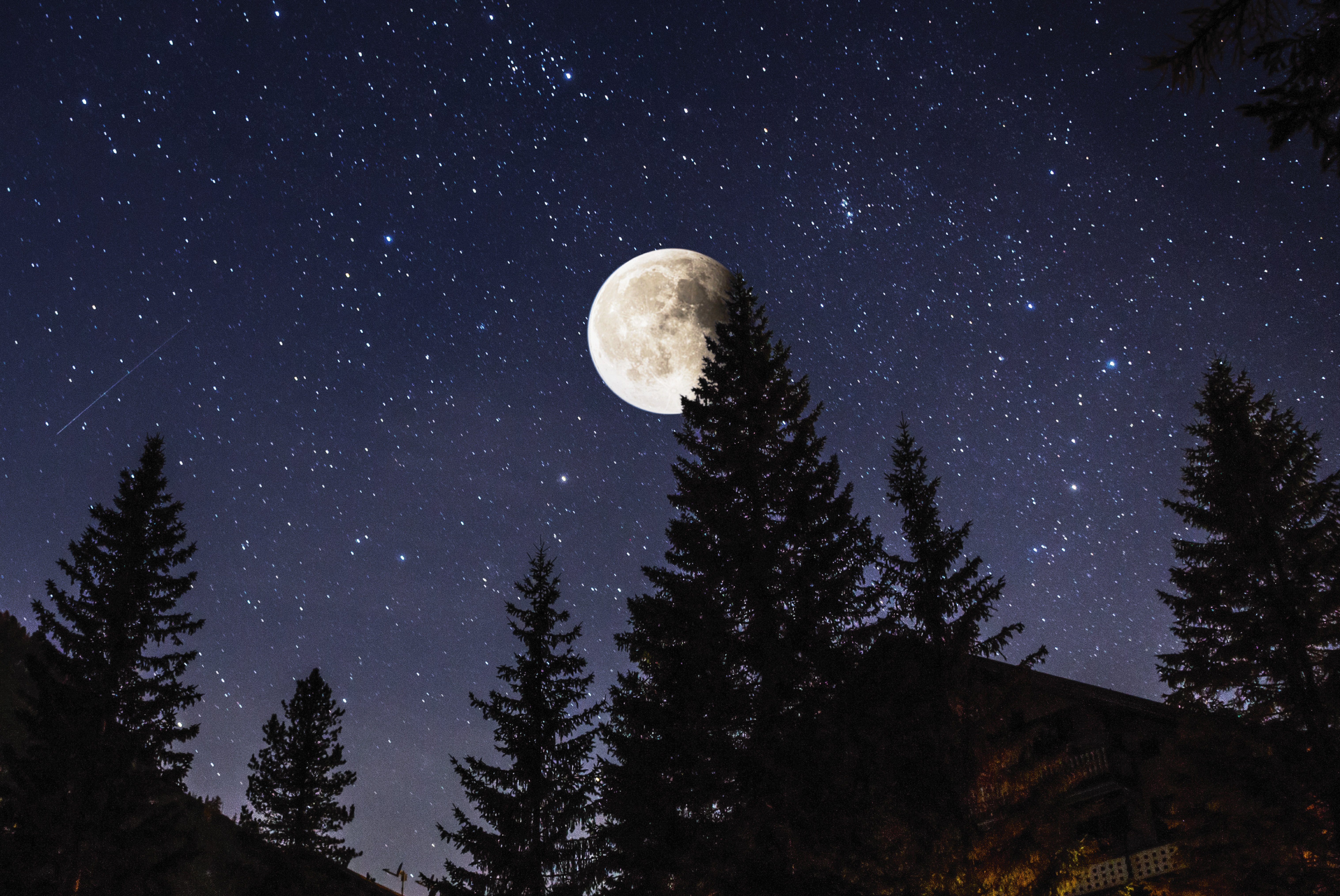 the moon and a clear, starry sky