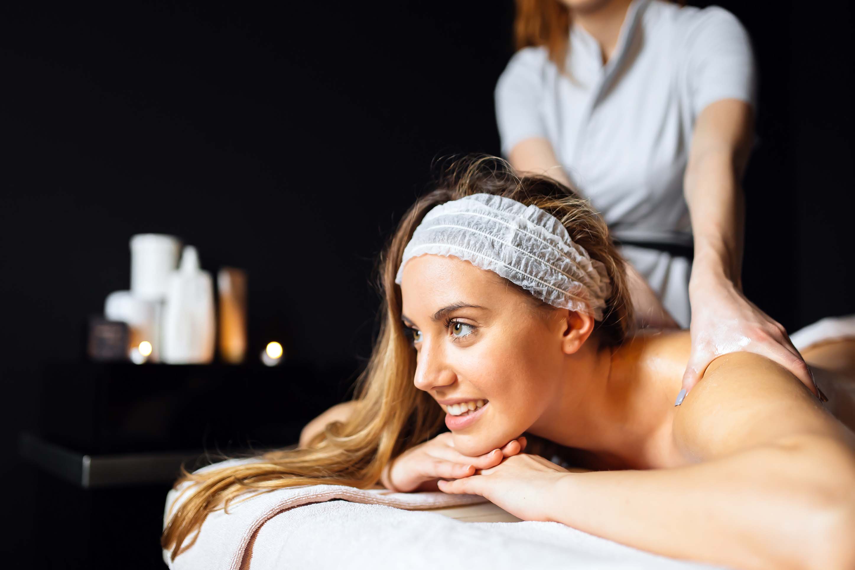woman getting a message at a spa