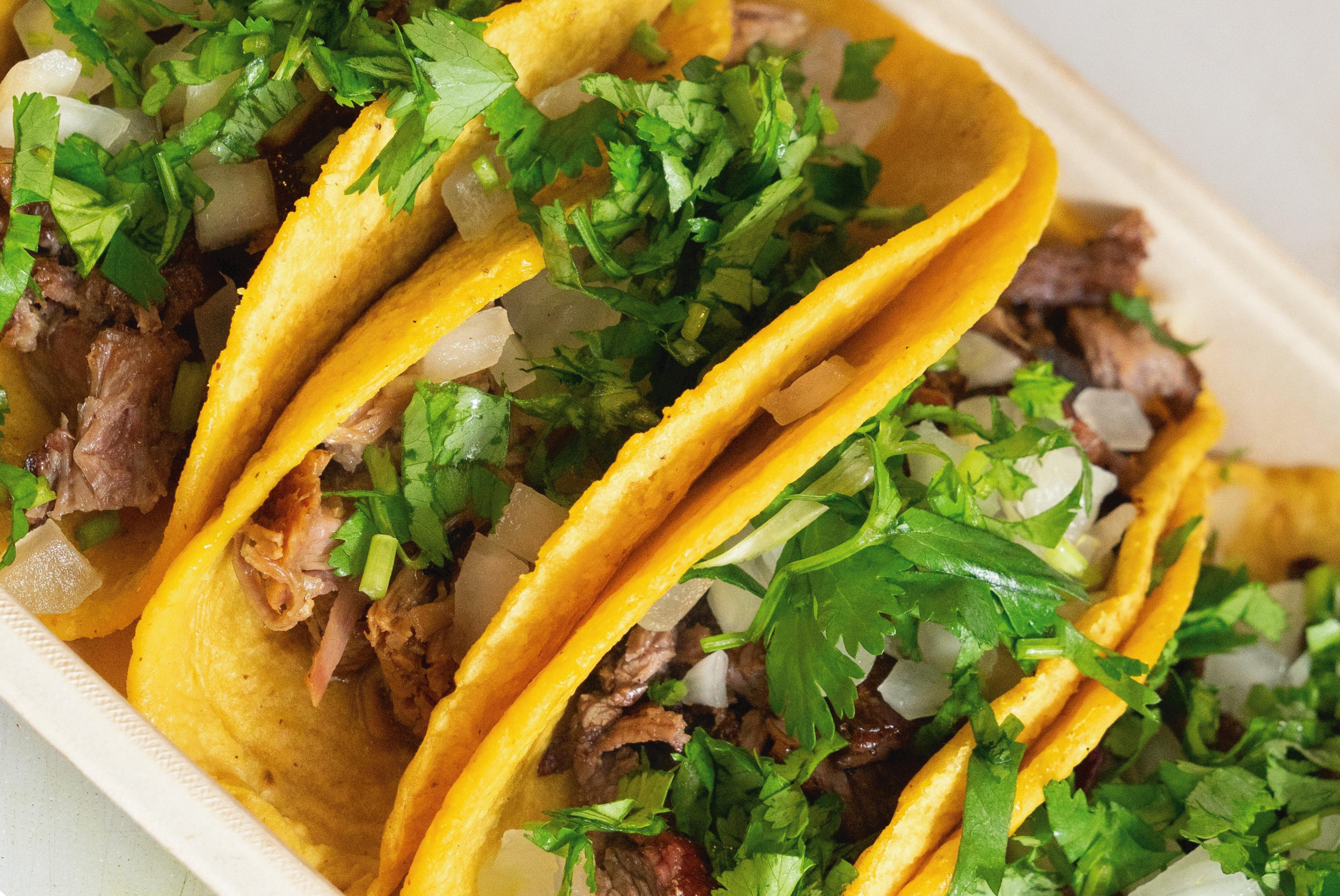 tacos with meat and cilantro