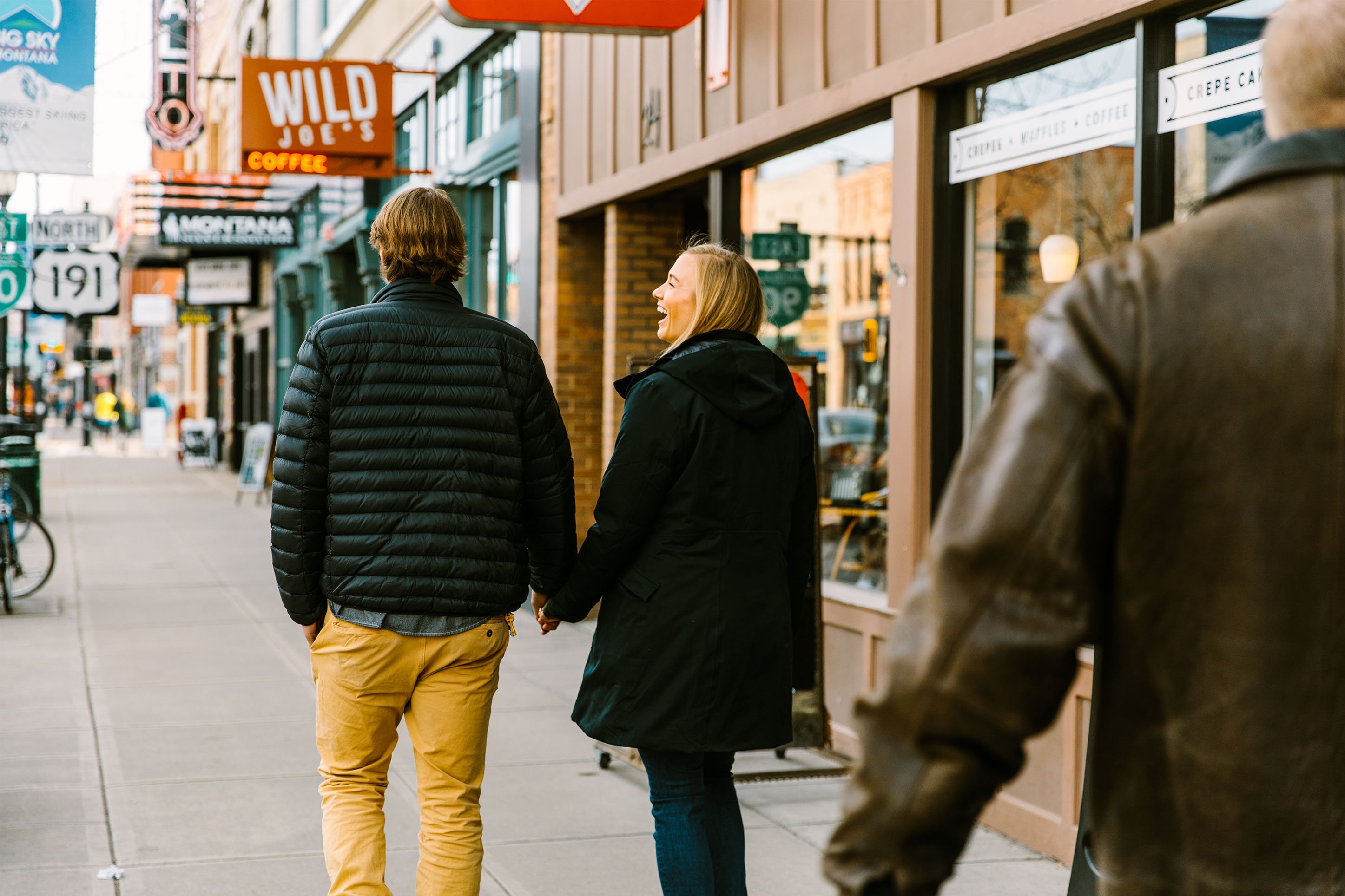 A couple walking downtown Bozeman. 