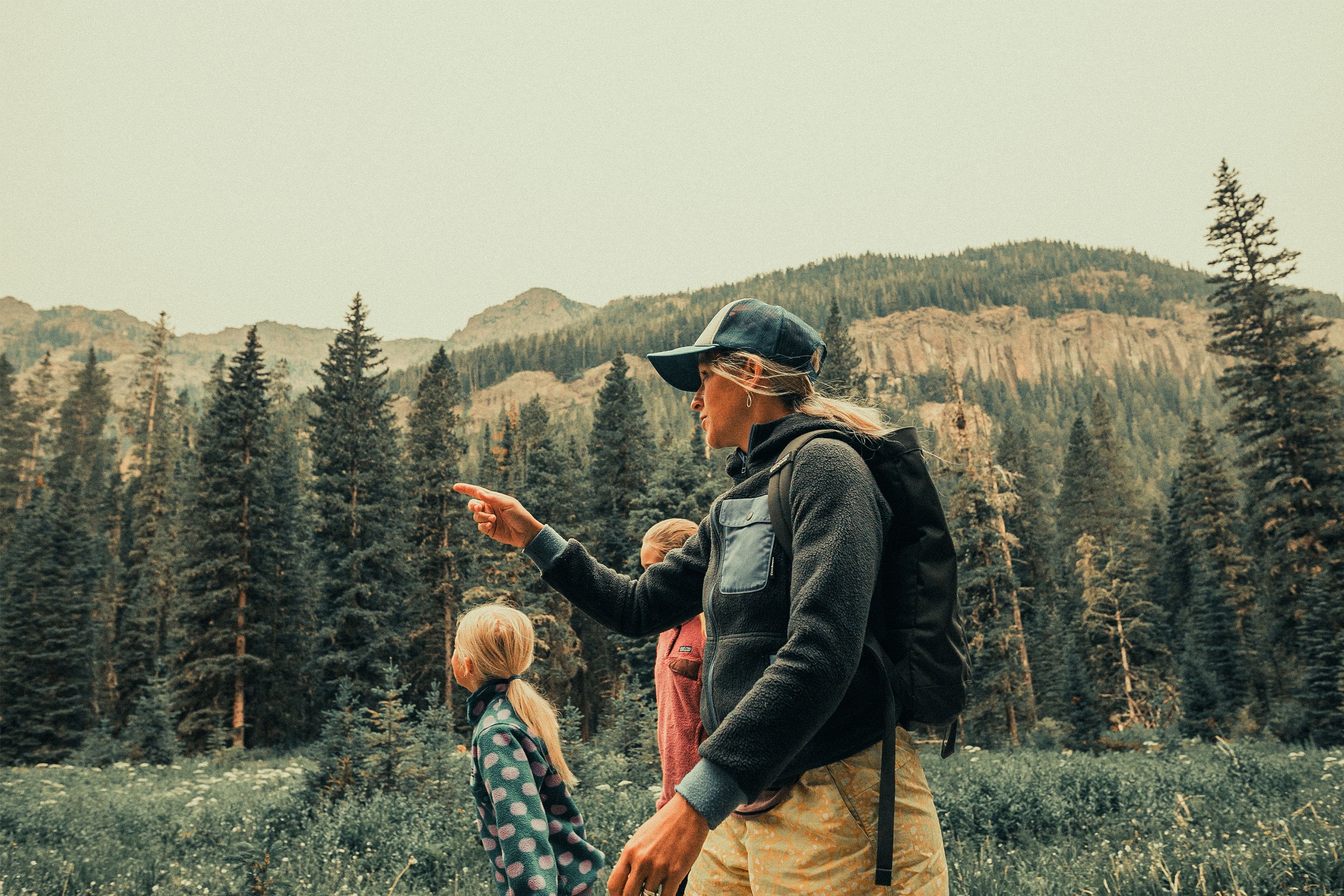 Mother hiking with two children up Hyalite Canyon. 