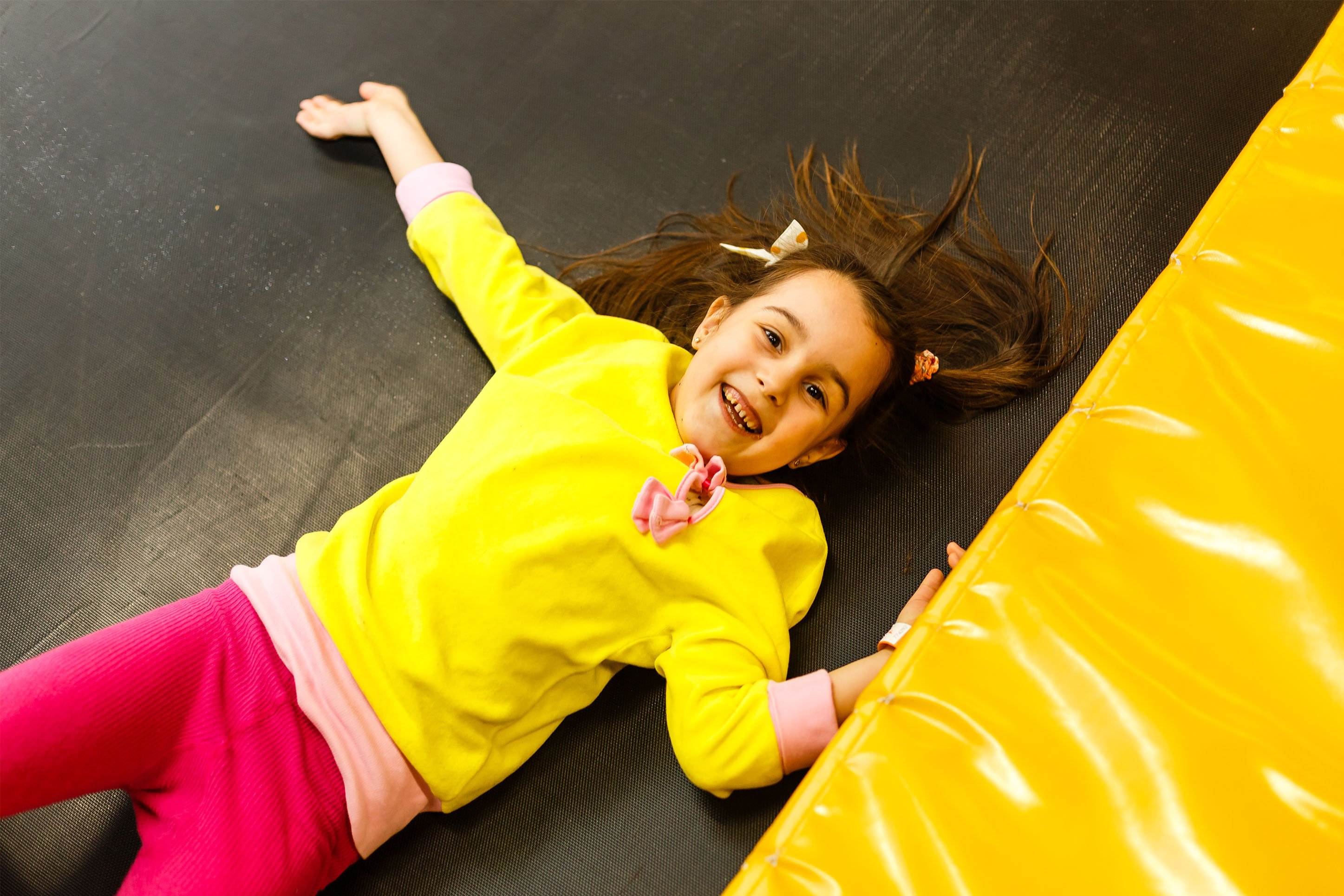 Young girl having fun in a kids zone