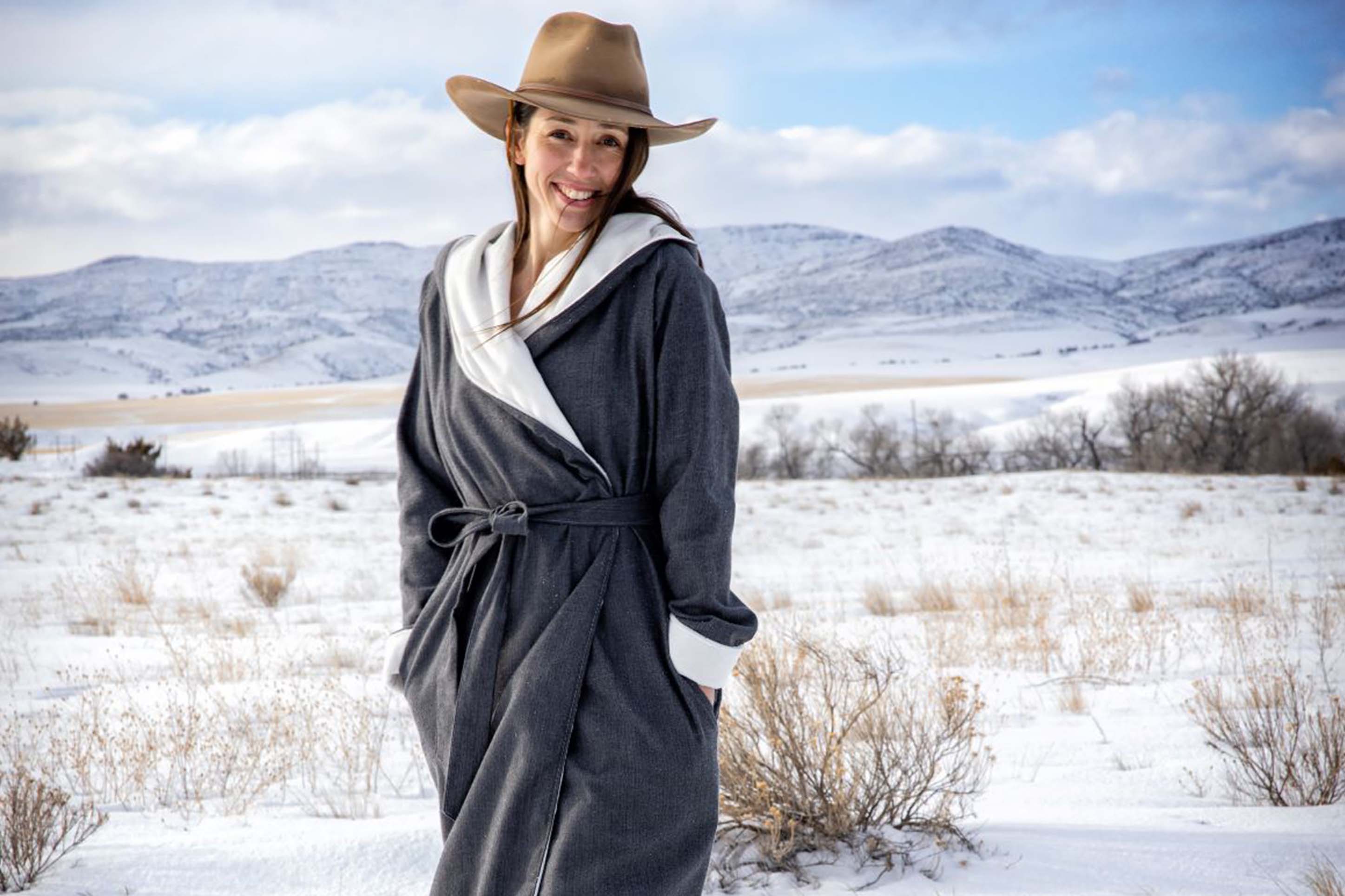 A woman wearing a bathrobe from Montana Robe Company