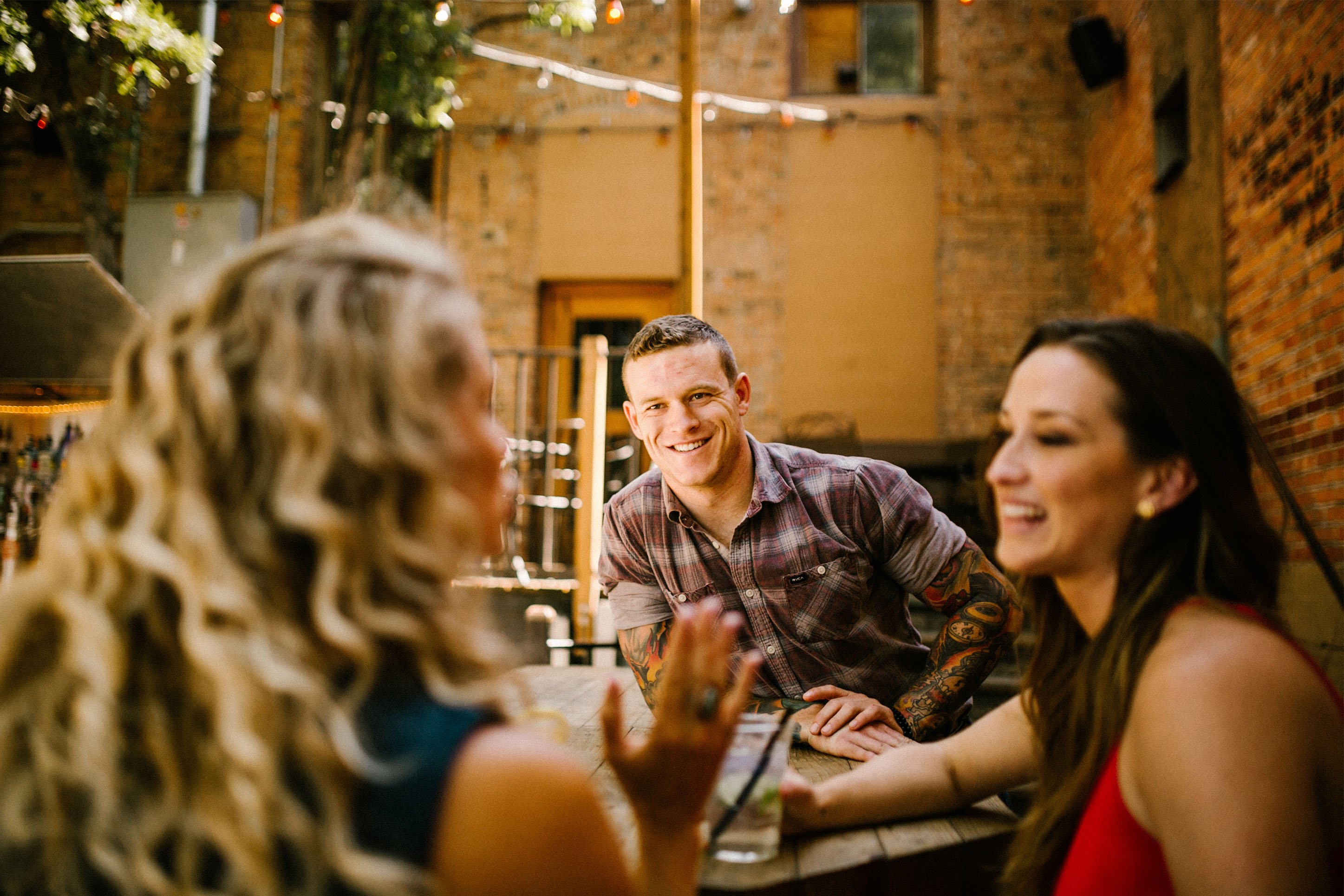 Photo of friends enjoying PLONK outdoor patio