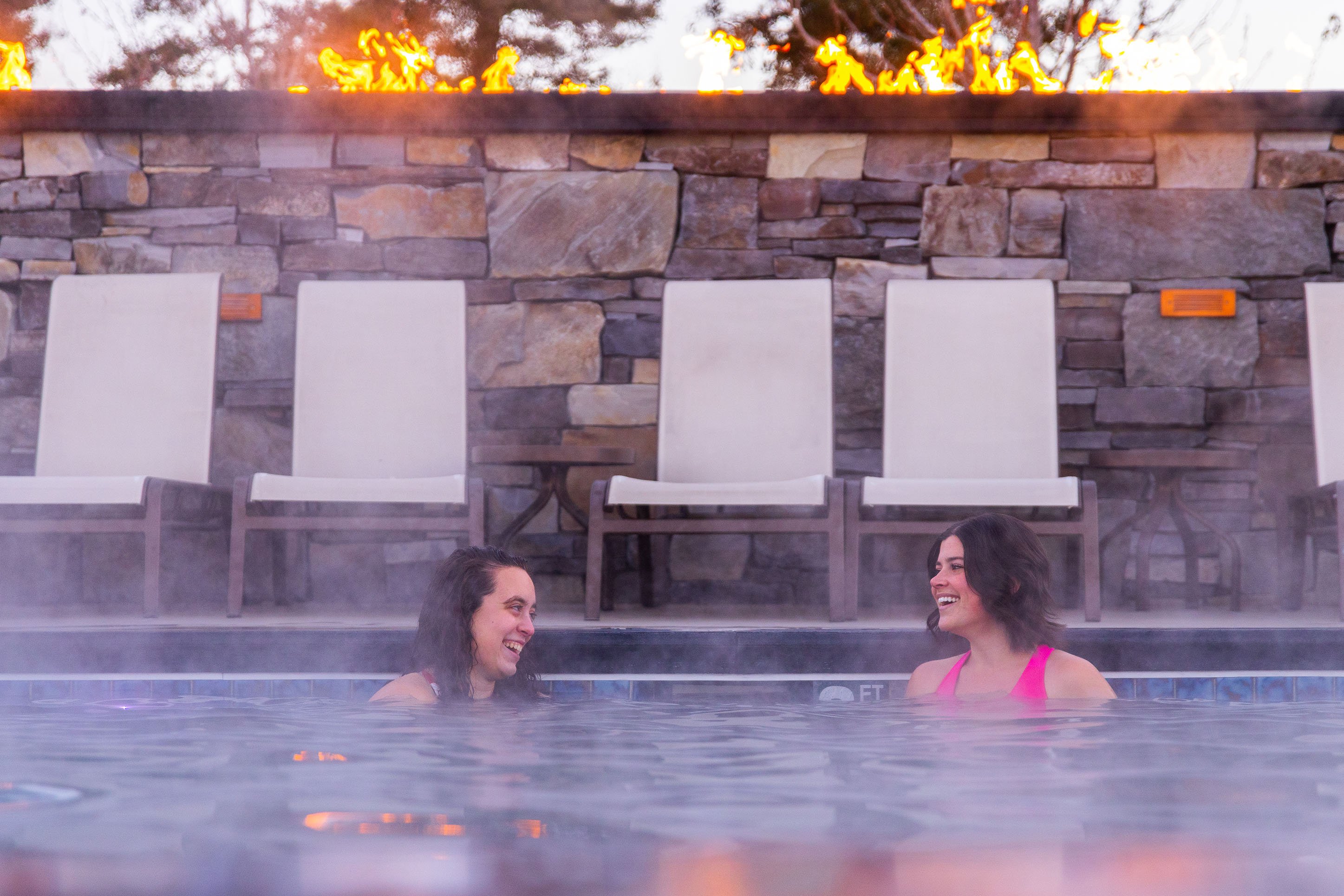 Two women soaking in Bozeman Hot Springs