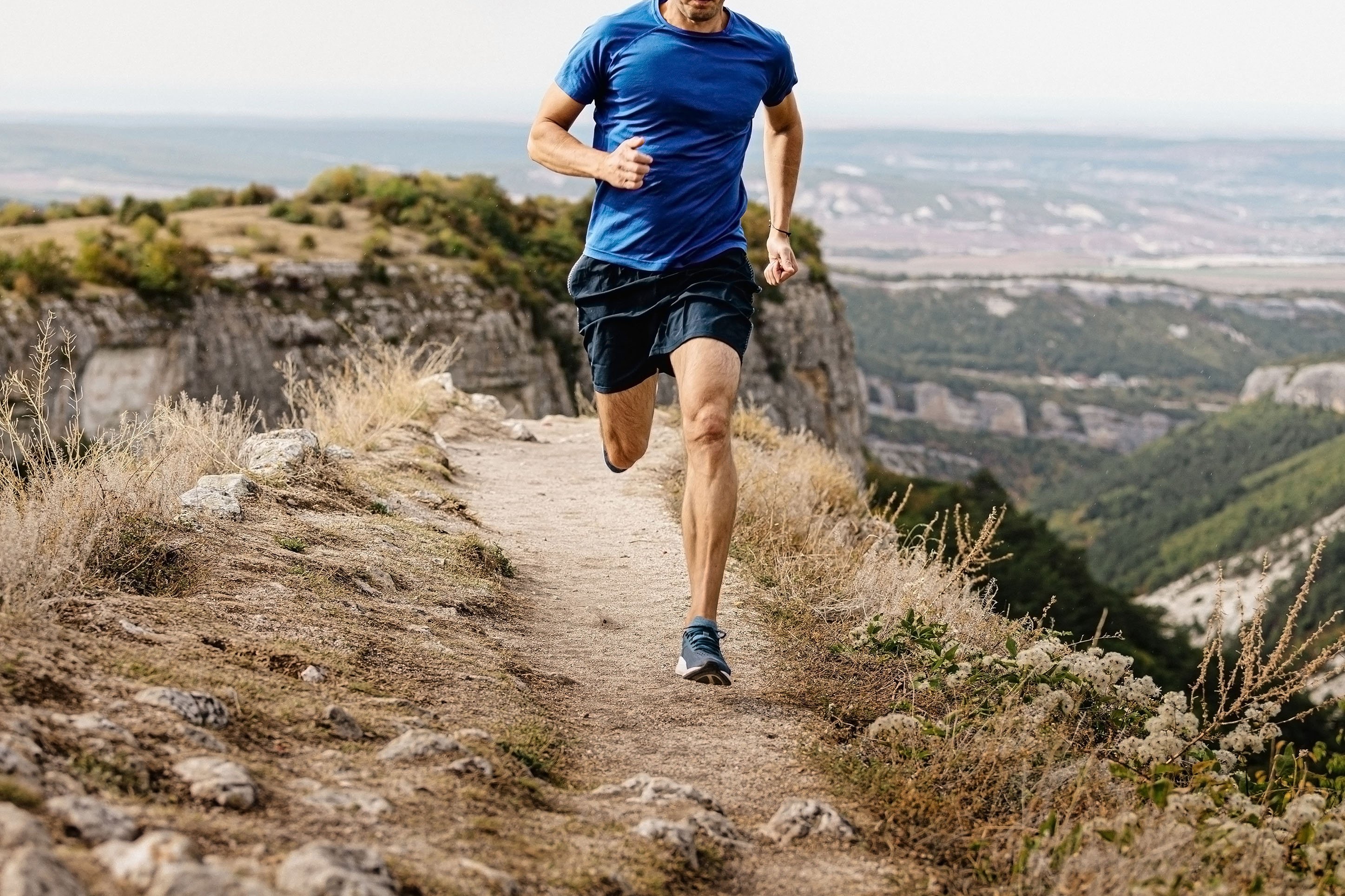 Trail runner on ridge