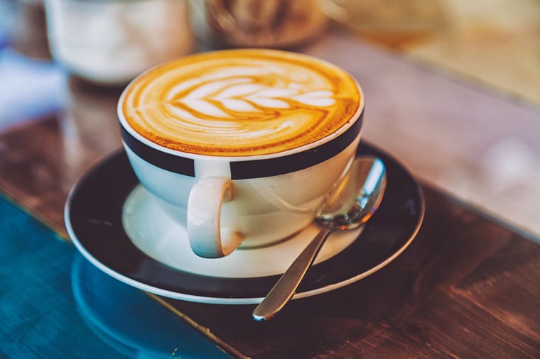 Photo of a latte with leaf latte art