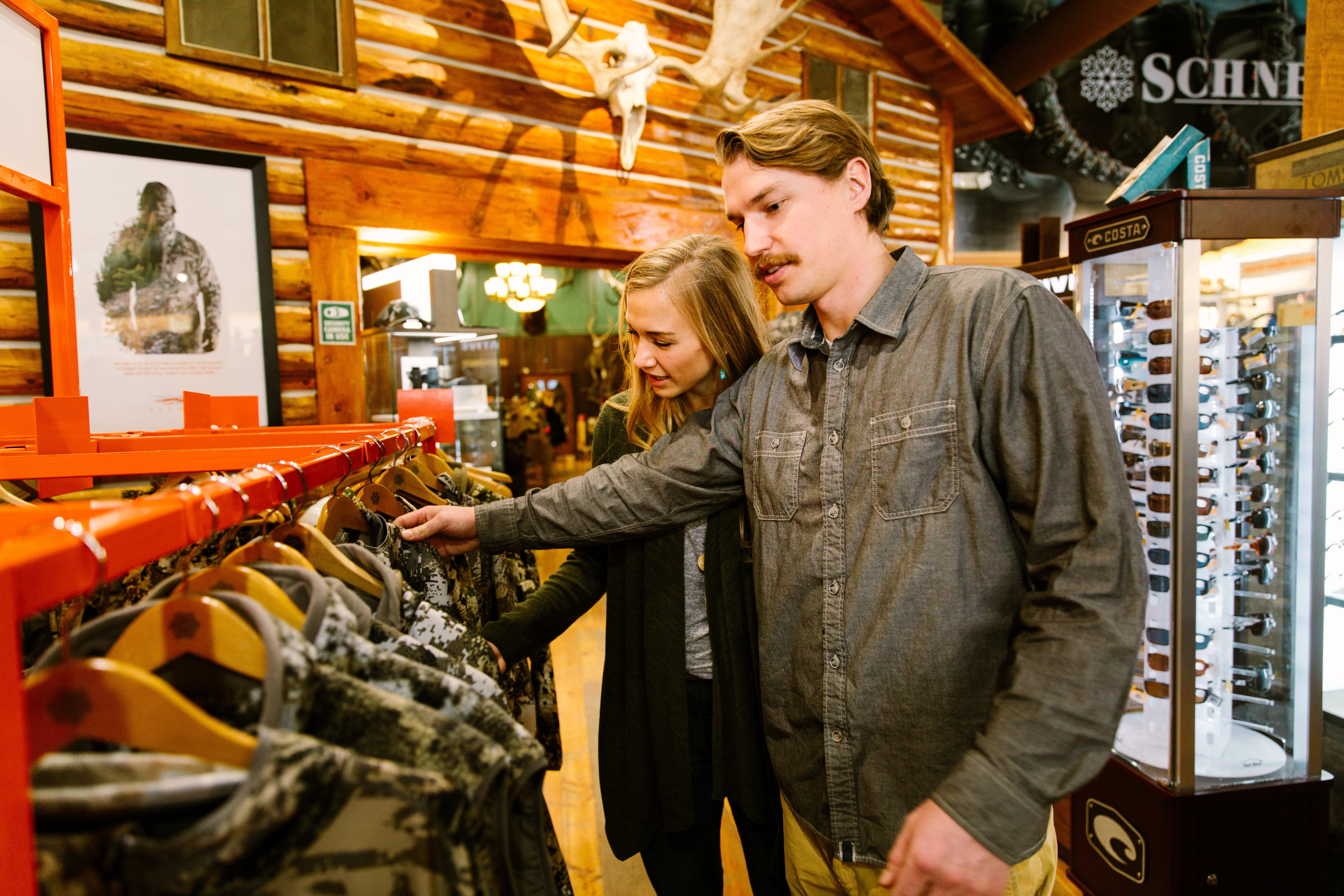 a couple shopping at Schnee's boots in Bozeman