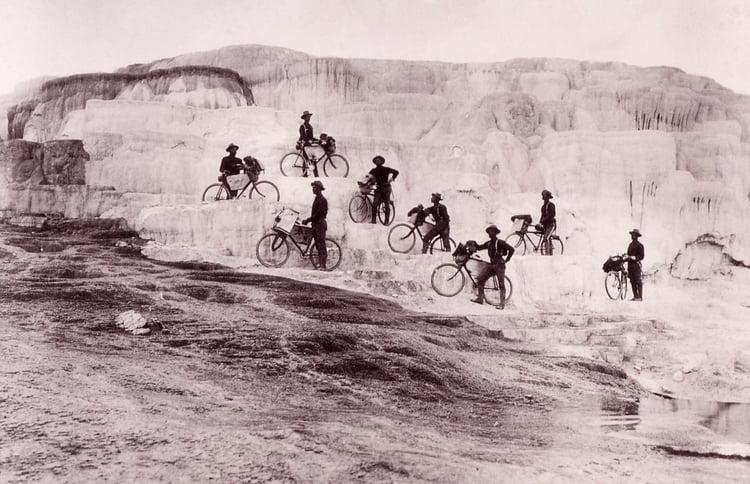 Army bicyclists on Mammoth Hot Springs Terraces; Photographer unknown; Around 1896 