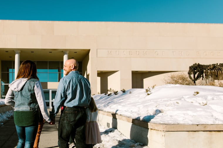 A couple walking into the Museum of the Rockies in Bozeman