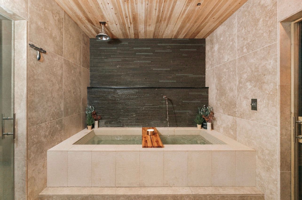 Bath in a room inside The Loft Spa