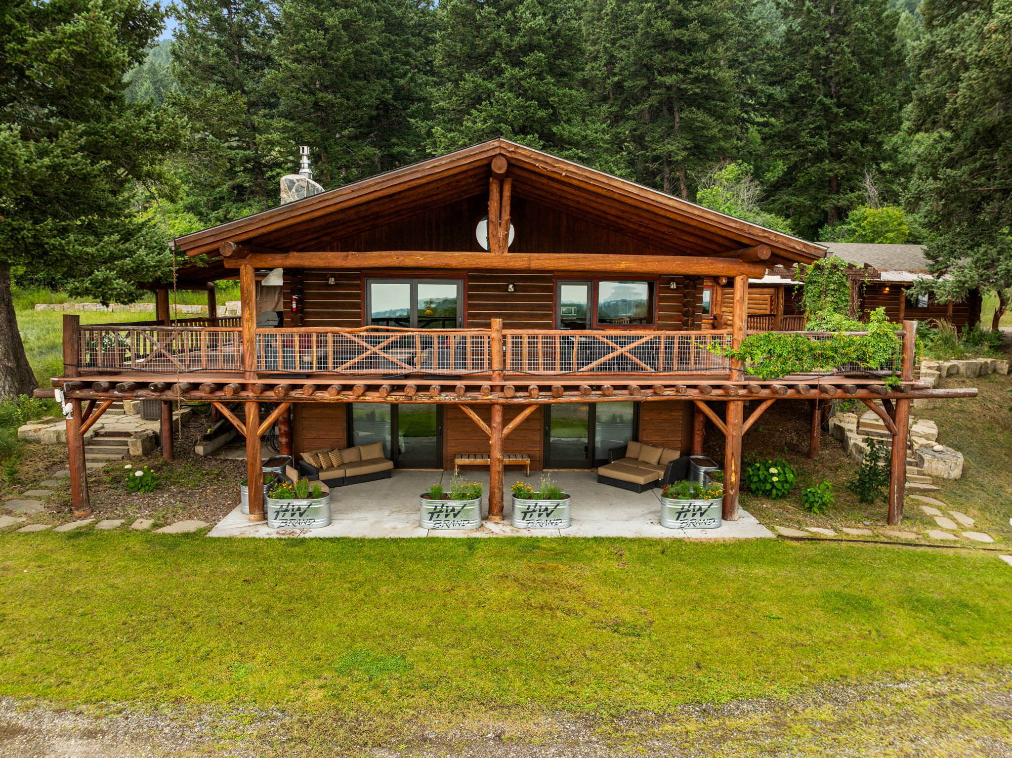 Large, cabin-style rental home with a wraparound deck in Montana